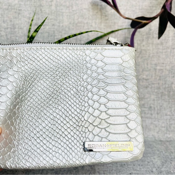 Silver faux leather snake print Rodan & Fields clutch or makeup bag. - Picture 5 of 6